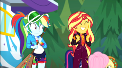 Size: 1920x1080 | Tagged: safe, screencap, applejack, fluttershy, rainbow dash, sci-twi, sunset shimmer, twilight sparkle, equestria girls, equestria girls specials, g4, my little pony equestria girls: better together, my little pony equestria girls: sunset's backstage pass, applejack's festival hat, clothes, female, geode of empathy, grin, happy, hat, jacket, magical geodes, outdoors, paddle, rainbow dash's paddle, rv, shorts, smiling, visor