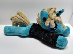 Size: 600x449 | Tagged: safe, artist:catnapcaps, pony, unicorn, as it is, beanie (plushie), clothes, commission, ear piercing, gauges, hair over one eye, horn, horn piercing, irl, male, nose piercing, patty walters, photo, piercing, plushie, ponified, prone, shirt, solo, stallion