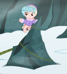 Size: 392x438 | Tagged: safe, screencap, cozy glow, pony, frenemies (episode), g4, clothes, coat, cropped, female, rock, snow, solo, winter outfit