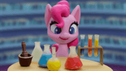 Size: 800x450 | Tagged: safe, screencap, pinkie pie, earth pony, pony, g4.5, my little pony: stop motion short, potion party, animated, female, gif, grin, hoof rubbing, mare, potion, smiling, solo, sparkles, stop motion, sunburst background, table, twilight's castle