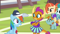 Size: 1920x1080 | Tagged: safe, screencap, lighthoof, rainbow dash, shimmy shake, smolder, snips, dragon, earth pony, pegasus, pony, unicorn, 2 4 6 greaaat, g4, buckball field, bucktooth, cheerleader, cheerleader outfit, cheerleader smolder, clothes, coach rainbow dash, coaching cap, colt, crossed arms, cute, cute little fangs, dashabetes, dragoness, fangs, female, foal, folded wings, frown, grin, horns, looking at each other, male, mare, multicolored mane, one eye closed, pleated skirt, pom pom, ponytail, rainbow dashs coaching whistle, sitting, smiling, smolderbetes, spitfire's whistle, teacher and student, teenaged dragon, teenager, whistle, whistle necklace, wink, young mare