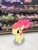 Size: 3024x4032 | Tagged: safe, photographer:undeadponysoldier, apple bloom, earth pony, pony, g4, apple, bow, female, filly, food, fruit, grocery store, in character, irl, photo, ponies in real life, solo, walmart