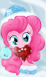 Size: 2893x4844 | Tagged: safe, artist:joycat, pinkie pie, pony, g4, christmas ornament, cute, decoration, diapinkes, female, heart, heart pillow, looking at you, mouth hold, pillow, solo, winter hat
