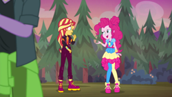 Size: 1600x900 | Tagged: safe, screencap, duke suave, pinkie pie, sunset shimmer, equestria girls, equestria girls series, g4, sunset's backstage pass!, spoiler:eqg series (season 2), clothes, dress, female, jacket, music festival outfit, pants, shoes, sneakers