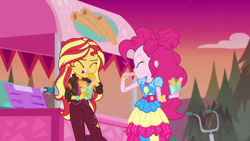 Size: 1920x1080 | Tagged: safe, screencap, pinkie pie, sunset shimmer, equestria girls, equestria girls specials, g4, my little pony equestria girls: better together, my little pony equestria girls: sunset's backstage pass, churros, duo, duo female, eating, female, food, food stand, geode of sugar bombs, magical geodes, music festival outfit, puffed pastry's churro stand