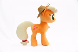 Size: 5184x3456 | Tagged: safe, artist:nekokevin, applejack, earth pony, pony, g4, applejack's hat, cowboy hat, female, freckles, hat, irl, mare, photo, plushie, side view, simple background, smiling, solo, white background