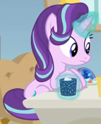 Size: 344x421 | Tagged: safe, screencap, starlight glimmer, pony, unicorn, g4, marks for effort, chocolate, cropped, desk, empathy cocoa, female, food, glowing, glowing cup, glowing horn, hooves on the table, horn, hot chocolate, looking at someone, mare, marshmallow, sitting, solo, starlight's office