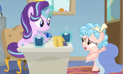 Size: 858x521 | Tagged: safe, screencap, cozy glow, starlight glimmer, pegasus, pony, unicorn, g4, marks for effort, blanket, chocolate, covered, desk, duo, empathy cocoa, food, glowing, glowing cup, glowing horn, hoof hold, hooves on the table, horn, hot chocolate, looking at each other, looking at someone, marshmallow, open mouth, sitting, starlight's office