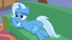Size: 1280x720 | Tagged: safe, screencap, trixie, pony, g4, road to friendship, couch, draw me like one of your french girls, on side, smiling, solo, stupid sexy trixie