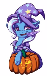 Size: 1000x1650 | Tagged: safe, artist:banoodle, trixie, pony, unicorn, cape, clothes, commission, cute, diatrixes, featured image, female, halloween, hat, holiday, knife, leg fluff, mare, mouth hold, pumpkin, pumpkin carving, simple background, solo, sweet dreams fuel, trixie's cape, trixie's hat, white background, ych result