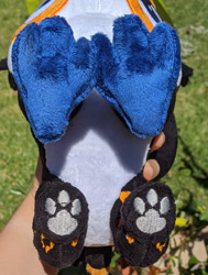 Size: 1433x1895 | Tagged: safe, artist:dungeondwellerrescue, oc, oc only, oc:tristão, bird, griffon, ocelot, toco toucan, toucan, toucan griffon, beak, commission, folded wings, irl, male, paw pads, paws, photo, plushie, solo, spots, talons, underpaw, wings