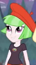 Size: 192x345 | Tagged: safe, screencap, watermelody, equestria girls, g4, my little pony equestria girls: legend of everfree, background human, beret, camp everfree logo, camp everfree outfits, clothes, cropped, female, hat, looking up, shirt, solo, t-shirt