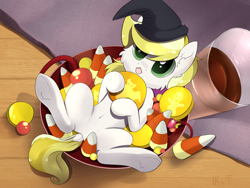 Size: 1600x1200 | Tagged: safe, artist:kebchach, oc, oc only, oc:dandelion blossom, pony, :<, bowl, candy, candy bowl, candy corn, cheek fluff, commission, cute, dock, food, halloween, hat, holiday, lying down, ocbetes, on back, solo, tiny, tiny ponies, tongue out, underhoof, witch hat, ych result