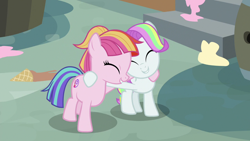 Size: 1280x720 | Tagged: safe, screencap, coconut cream, toola roola, earth pony, pony, fame and misfortune, g4, season 7, ^^, cute, duo, duo female, eyes closed, female, filly, foal, happy, hug, multicolored mane, multicolored tail, roolabetes, smiling, tail