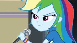 Size: 1920x1080 | Tagged: safe, screencap, rainbow dash, equestria girls, g4, my little pony equestria girls: friendship games, chs rally song, clothes, female, microphone, shirt, solo, t-shirt, teenager, wristband