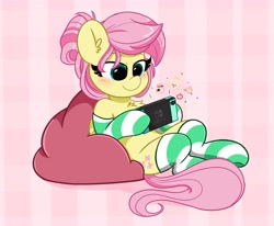 Size: 4096x3372 | Tagged: safe, artist:kittyrosie, fluttershy, pegasus, pony, g4, alternate hairstyle, blushing, chest fluff, clothes, cute, ear fluff, female, gamershy, hair bun, high res, isabelle (animal crossing), mare, nintendo switch, playing, shyabetes, sitting, socks, solo, striped socks