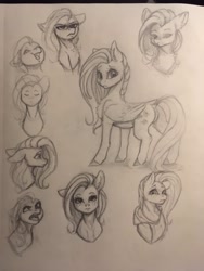 Size: 1536x2048 | Tagged: safe, artist:miokomata, fluttershy, pegasus, pony, g4, bust, butt, clothes, dock, eyes closed, female, floppy ears, freckles, freckleshy, hoodie, mare, monochrome, open mouth, plot, sketch, sketch dump, solo, tail, traditional art