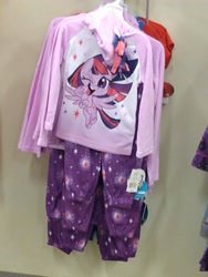 Size: 3120x4160 | Tagged: safe, twilight sparkle, alicorn, pony, g4, g4.5, clothes, irl, long sleeved shirt, looking at you, merchandise, one eye closed, photo, sleepwear, solo, store, target demographic, twilight sparkle (alicorn), wink, winking at you