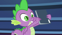 Size: 1920x1080 | Tagged: safe, screencap, spike, dragon, g4, the last problem, comic book, library, male, solo, twilight's castle, twilight's castle library, winged spike, wings