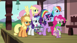 Size: 1920x1080 | Tagged: safe, screencap, applejack, fluttershy, pinkie pie, rainbow dash, rarity, spike, twilight sparkle, alicorn, dragon, earth pony, pegasus, pony, unicorn, g4, the last problem, cage, glowing horn, horn, magic, magic aura, mane seven, mane six, train station, twilight sparkle (alicorn), winged spike, wings, worried