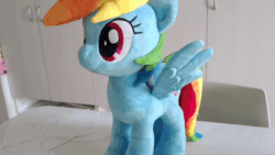 Size: 800x450 | Tagged: safe, artist:nekokevin, rainbow dash, pegasus, pony, g4, animated, cute, dashabetes, female, gif, irl, looking at you, mare, nekokevin is trying to murder us, photo, plushie, smiling, solo, spread wings, wings
