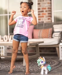 Size: 1080x1289 | Tagged: safe, princess celestia, human, unicorn, g4, g4.5, my little pony: pony life, official, advertisement, barefoot, clothes, feet, instagram, irl, irl human, photo, shirt, target demographic, toy