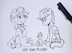 Size: 2048x1532 | Tagged: safe, artist:lightisanasshole, oc, oc:dorm pony, oc:wild waterfall, cat, dinosaur, pegasus, pony, unicorn, blushing, cheek fluff, chest fluff, duo, ear fluff, holding a pony, horn, looking at each other, marker, marker drawing, neck fluff, pegasus oc, photo, plushie, shipping, sitting, smiling, text, traditional art, unicorn oc, wings