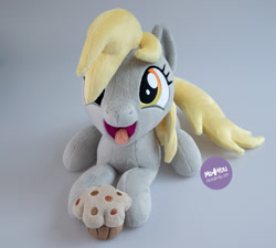 Size: 1400x1259 | Tagged: safe, artist:meplushyou, derpy hooves, pegasus, pony, g4, cute, derpabetes, food, irl, lying down, muffin, photo, plushie, prone, solo, tongue out