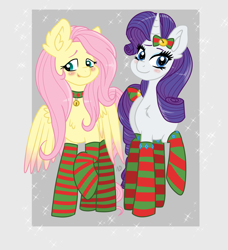 Size: 2976x3266 | Tagged: safe, artist:dreamy990, fluttershy, rarity, pegasus, pony, unicorn, g4, bell, bell collar, blushing, bow, cat bell, chest fluff, choker, christmas, clothes, collar, colored wings, colored wingtips, duo, ear fluff, high res, holiday, looking at you, looking away, raised hoof, ribbon, smiling, socks, sparkles, spread wings, standing, striped socks, tail bow, wings
