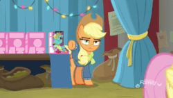 Size: 1280x720 | Tagged: safe, screencap, applejack, fluttershy, holly the hearths warmer doll, earth pony, pegasus, pony, g4, my little pony best gift ever, animated, applejack is not amused, clothes, doll, female, mare, solo focus, sound, toy, unamused, webm, winter outfit