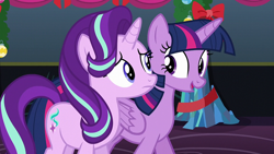 Size: 1920x1080 | Tagged: safe, screencap, starlight glimmer, twilight sparkle, alicorn, pony, unicorn, a hearth's warming tail, g4, bow, female, folded wings, frown, looking at each other, mare, twilight sparkle (alicorn), wings