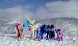 Size: 2048x1217 | Tagged: safe, photographer:pakapaka1993, princess cadance, princess celestia, princess luna, twilight sparkle, g4, alicorn tetrarchy, irl, photo, plushie, snow, twilight sparkle (alicorn)