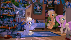 Size: 3840x2160 | Tagged: safe, artist:owlpirate, applejack, derpy hooves, fluttershy, earth pony, pegasus, pony, g4, 3d, 4k, christmas, christmas tree, christmas wreath, coffee mug, female, fluttershy's cottage, food, high res, holiday, hoof hold, looking at you, mare, muffin, mug, present, snow, snowfall, source filmmaker, tree, window, wreath