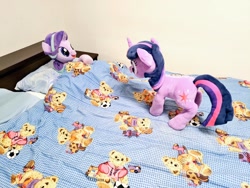 Size: 1024x768 | Tagged: safe, artist:nekokevin, starlight glimmer, twilight sparkle, pony, unicorn, series:nekokevin's glimmy, g4, bed, bedsheets, duo, female, irl, looking at each other, lying down, mare, on back, photo, pillow, plushie, underhoof, unicorn twilight