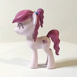 Size: 600x600 | Tagged: safe, artist:mraagh, oc, oc only, oc:violet ray, earth pony, pony, 3d, 3d print, cute, cutie mark, eyes closed, female, figurine, happy, irl, magenta mane, mare, painted, photo, pink coat, ponytail, simple background, solo, standing, wavy mane