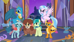 Size: 1366x768 | Tagged: safe, screencap, gallus, ocellus, sandbar, silverstream, smolder, yona, changedling, changeling, classical hippogriff, dragon, earth pony, griffon, hippogriff, pony, yak, g4, she's all yak, arms, bow, bowtie, cloven hooves, colored hooves, confused, dragoness, female, flying, hair bow, jewelry, male, monkey swings, necklace, raised eyebrow, spread wings, student six, teenager, wings