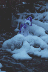 Size: 600x900 | Tagged: safe, artist:synch-anon, rarity, pony, unicorn, g4, animated, irl, photo, plushie, snow, snowfall, solo, water, waterfall