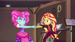 Size: 1920x1080 | Tagged: safe, screencap, kiwi lollipop, sunset shimmer, equestria girls, equestria girls specials, g4, my little pony equestria girls: better together, my little pony equestria girls: sunset's backstage pass, female, geode of empathy, magical geodes, music festival outfit, time twirler, tug of war