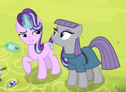 Size: 1047x767 | Tagged: safe, screencap, maud pie, starlight glimmer, earth pony, pony, unicorn, g4, rock solid friendship, bonding, clothes, cropped, cute, duo, emotionless, eyeshadow, female, frown, glowing horn, glue stick, grin, horn, kite, kite flying, lidded eyes, looking at each other, magic, makeup, mare, narrowed eyes, raised eyebrow, raised hoof, shipping fuel, smiling, smirk, starlight glimmer is best facemaker, telekinesis