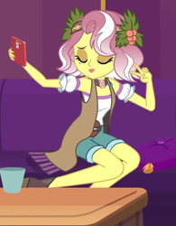 Size: 716x919 | Tagged: safe, screencap, vignette valencia, equestria girls, equestria girls series, g4, inclement leather, spoiler:choose your own ending (season 2), spoiler:eqg series (season 2), beauty mark, cellphone, clothes, cropped, cup, eyes closed, eyeshadow, female, flower, flower in hair, holly, inclement leather: vignette valencia, legs, makeup, peace sign, phone, pillow, pose, shorts, smartphone, solo, table