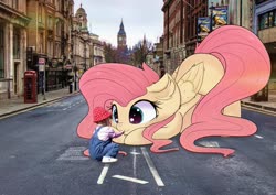 Size: 1359x960 | Tagged: safe, artist:janelearts, fluttershy, human, pegasus, pony, g4, giant pony, irl, irl human, london, macro, photo, ponies in real life, united kingdom