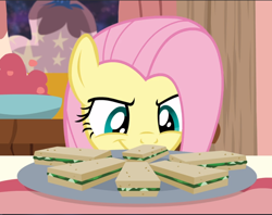 Size: 1192x943 | Tagged: safe, screencap, fluttershy, pegasus, pony, discordant harmony, g4, cropped, female, food, grin, mare, plate, sandwich, smiling, solo