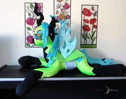 Size: 1280x1010 | Tagged: safe, artist:purplenebulastudios, queen chrysalis, changeling, changeling queen, g4, bodysuit, clothes, flight suit, goggles, irl, photo, plushie, prone, solo