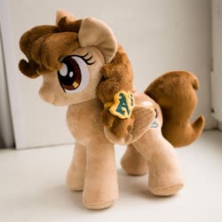 Size: 2200x2200 | Tagged: safe, artist:valmiiki, oc, oc only, oc:vanilla creame, pegasus, pony, cute, female, folded wings, high res, irl, mare, oakland athletics, photo, plushie, side view, simple background, solo, wings