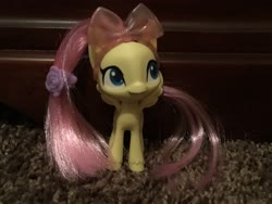 Size: 3264x2448 | Tagged: safe, fluttershy, pegasus, pony, g4.5, my little pony: pony life, accessory, bow, cute, female, hairpin, high res, irl, mare, photo, picture, shyabetes, solo, toy, unshorn fetlocks, wings