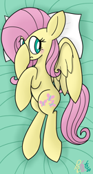 Size: 990x1832 | Tagged: safe, artist:notadeliciouspotato, fluttershy, pegasus, pony, g4, bed, blushing, body pillow, covering face, female, frown, hoof on head, lying down, mare, on side, pillow, signature, solo, spread wings, wings