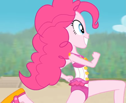 Size: 1319x1080 | Tagged: safe, screencap, pinkie pie, equestria girls, equestria girls series, forgotten friendship, g4, beach, bowtie, clothes, cropped, curly hair, cute, diapinkes, female, flipper, forest, forest background, geode of sugar bombs, legs, magical geodes, one-piece swimsuit, outdoors, pinkie pie swimsuit, running, sky, sleeveless, smiling, swimsuit, tree, walkway