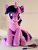 Size: 768x1024 | Tagged: safe, artist:nekokevin, twilight sparkle, pony, unicorn, g4, female, frog (hoof), irl, looking at you, mare, open mouth, photo, plushie, raised hoof, scissors, sitting, smiling, solo, underhoof, unicorn twilight