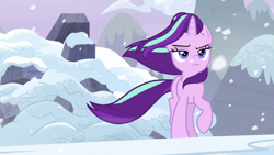 Size: 1920x1080 | Tagged: safe, screencap, starlight glimmer, pony, unicorn, g4, the ending of the end, badass, female, frown, lidded eyes, mare, raised hoof, snow, snowfall, solo, walking away, windswept mane