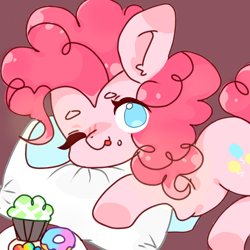 Size: 650x650 | Tagged: dead source, safe, artist:door_doorchild, pinkie pie, earth pony, pony, g4, :p, blushing, cupcake, cute, diapinkes, donut, ear fluff, female, food, looking at you, mare, no pupils, one eye closed, pillow, prone, simple background, solo, tongue out, wink